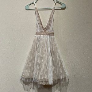 Strappy back plunging neckline pink and white tulle dress